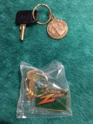Two John Deere L & G Key Fobs Product Intros
